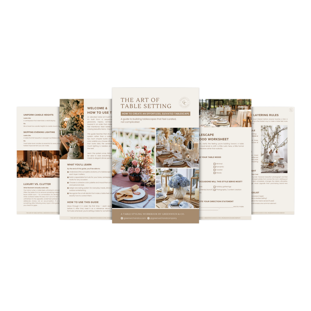 A workbook set of printed table-setting guide pages fanned out against a black background. The center page is titled "THE ART OF TABLE SETTING" and shows styled dining tables, tablescapes, hosting, parties, floral arrangements, and place settings. Home decor